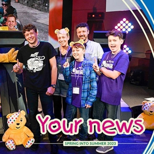 Group of people smiling. The text at the bottom says your news