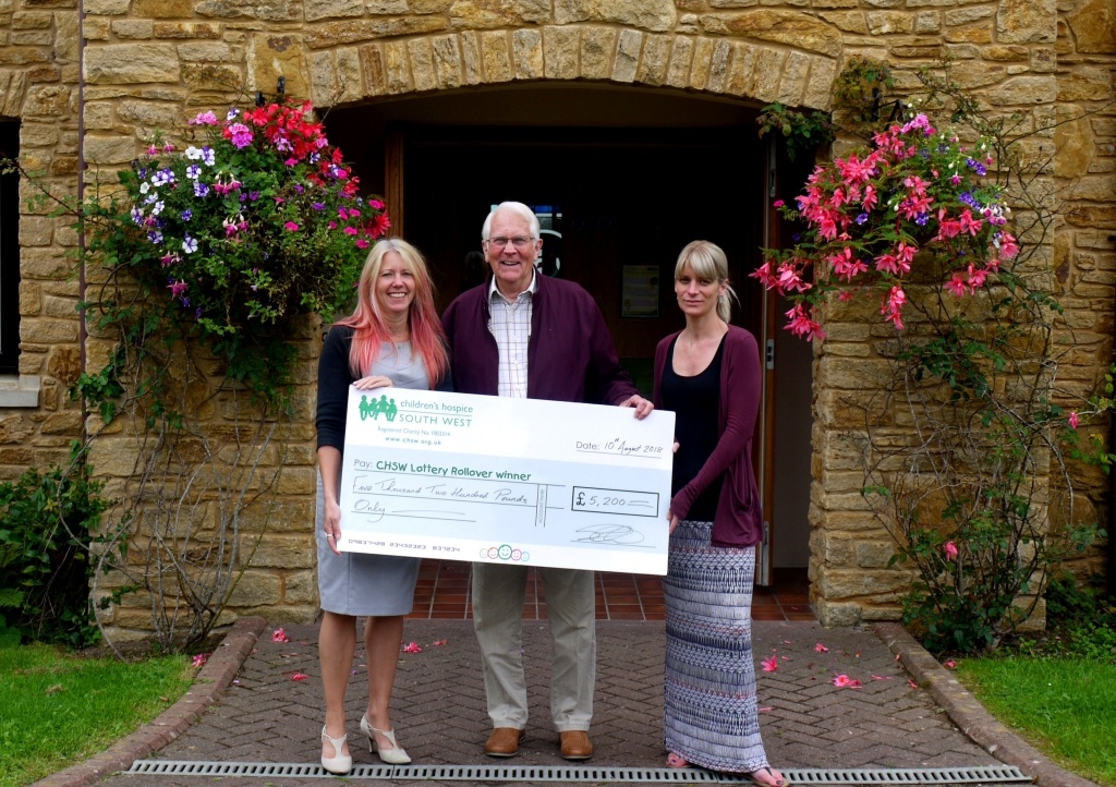 Norman-collects-cheque-from-Little-Bridge-House