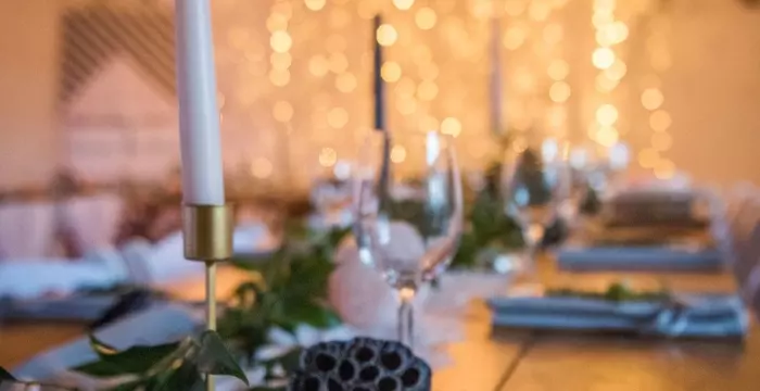 Decorative wedding place setting with pillar candle