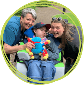 Reuben with his sister and the sibling support team