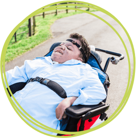 Boy outside in wheelchair