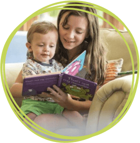 Children reading a story book together