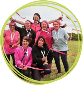 Group of CHSW volunteers dressed in pink