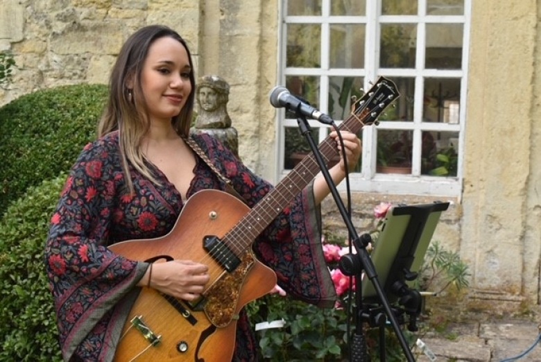 Female musician at Iford Manor