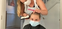 Kisa Benson during her head shave thumbnail