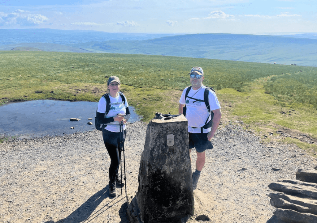 Members of the team at the top of a peak