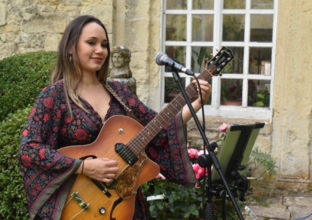 Female musician at Iford Manor