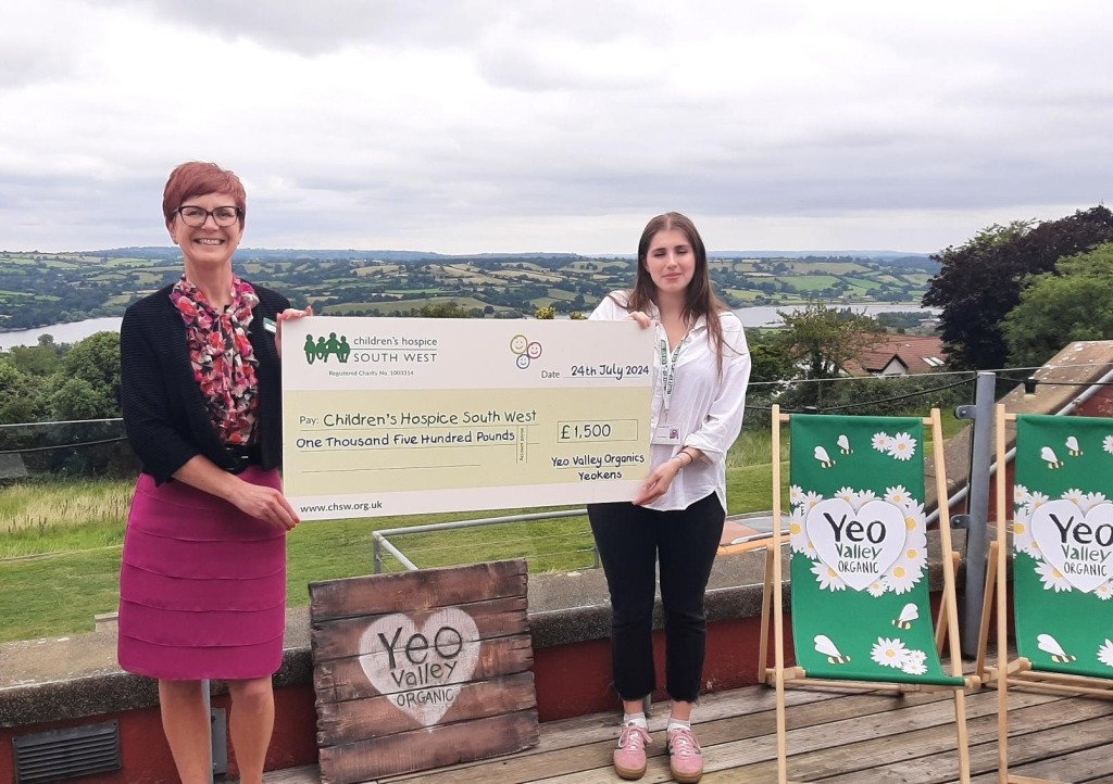 Hayley Wallbank from CHSW receives the Yeo Valley donation from Josie Coupland