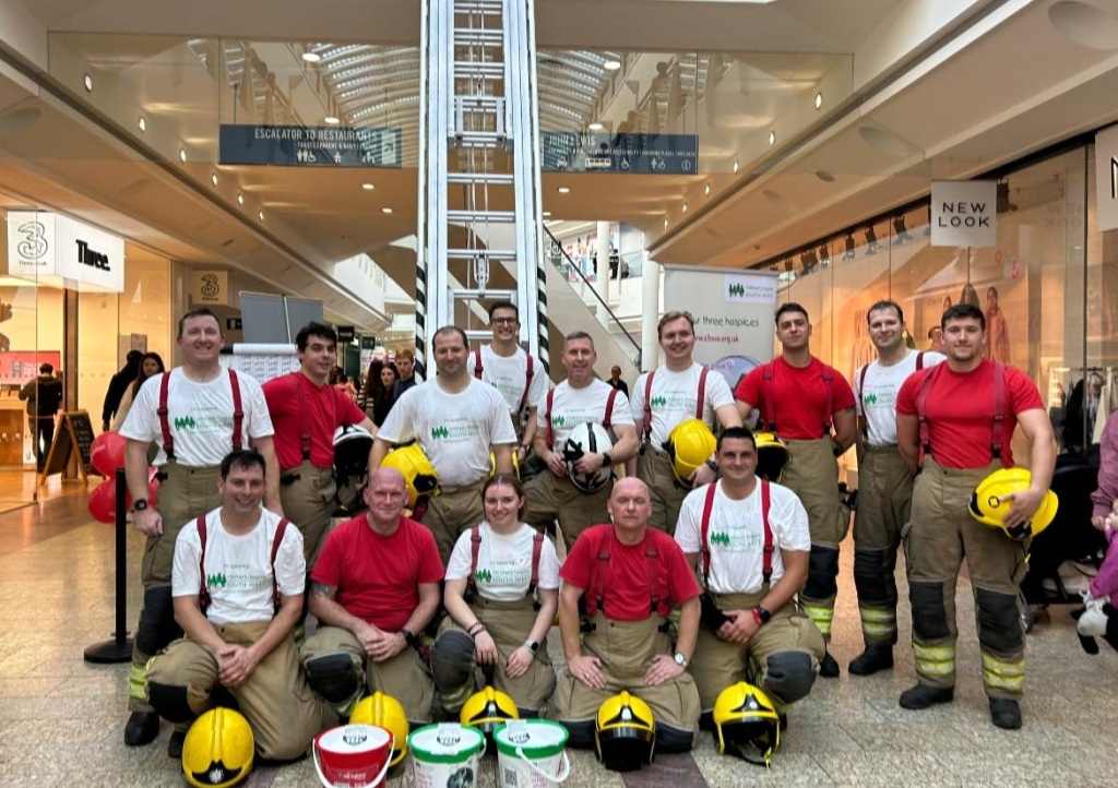 Firefighters do a ladder climb for CHSW