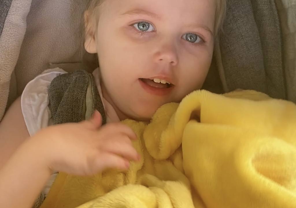 A little girl in pushchair A little girl in pushchair