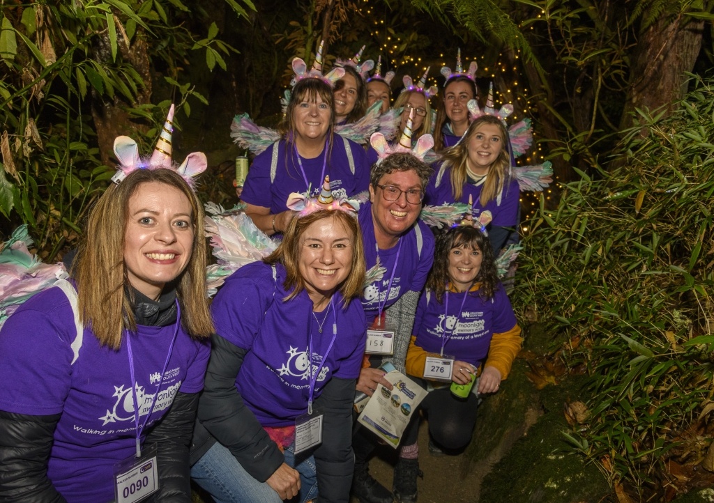 Participants in fancy dress walking through Heligan