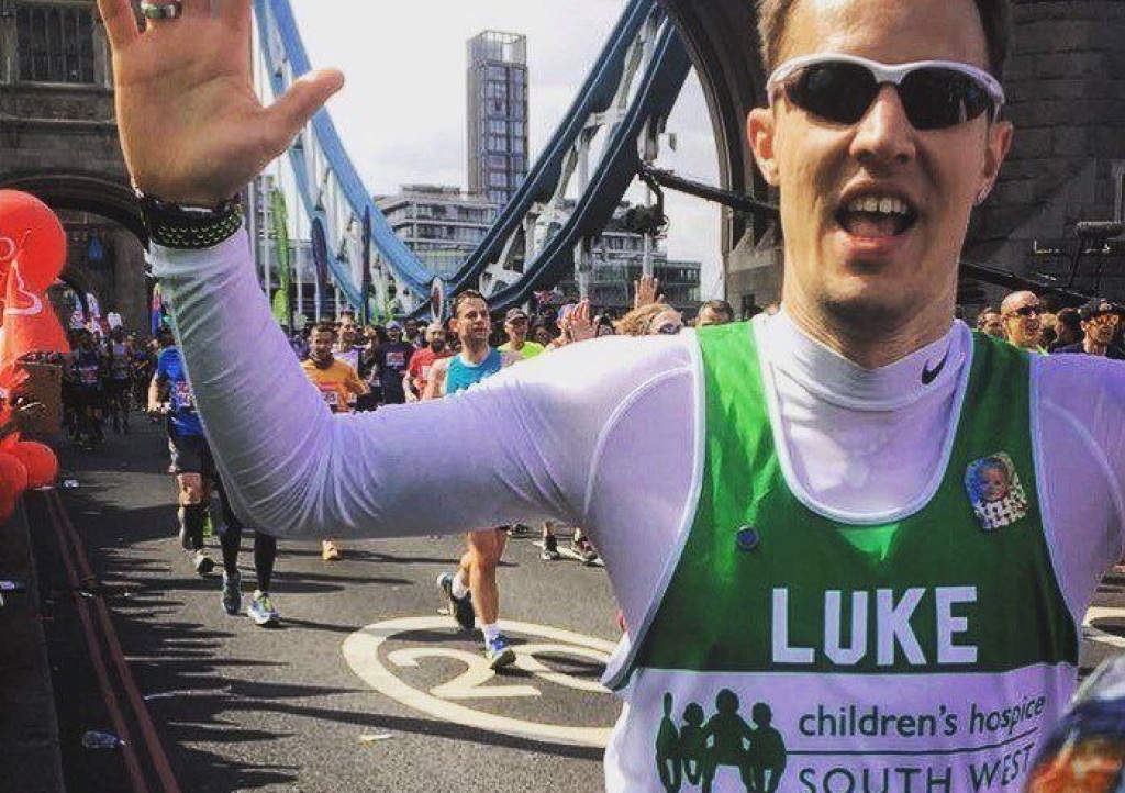 Luke Compton pictured crossing Tower Bridge in the 2017 Virgin Money London Marathon for Children's Hospice South West