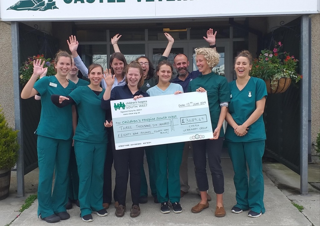 Castle Vets hand over their donation of £3877.64 for CHSW
