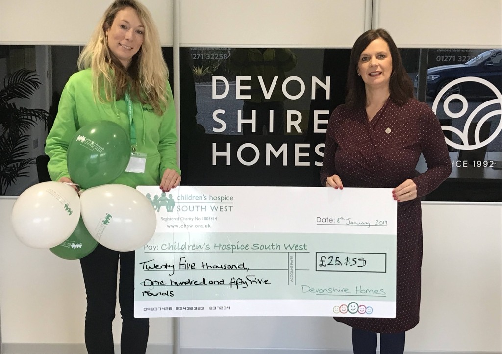 Jane Pearce (right), sales and marketing director at Devonshire Homes, presents the fundraising cheque to Mhairi Bass-Carruthers, corporate partnerships fundraiser at Children’s Hospice South West 