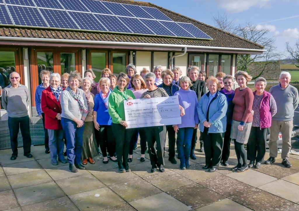 Wendy Walker and fellow members of the Enmore Park Golf Club Ladies’ Section present the fundraising to CHSW community fundraiser Laura Robertson