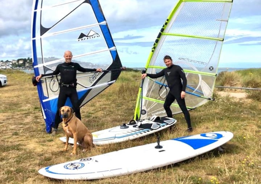 Joe Mitchell, pictured with friend and training partner Nathan Long, is preparing to windsurf to Lundy to raise money for Children’s Hospice South West