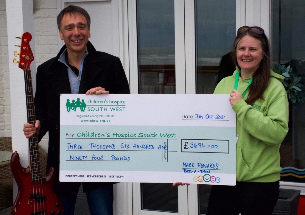 Mark Edwards presents his fundraising cheque to CHSW area fundraiser Ruth Morgan. Picture: Kevin Green