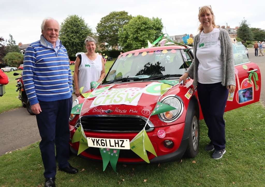 CHSW co-founder and chief executive Eddie Farwell at the Mini run with sibling team members Sally Norden and Adele Smyth-Richards.  