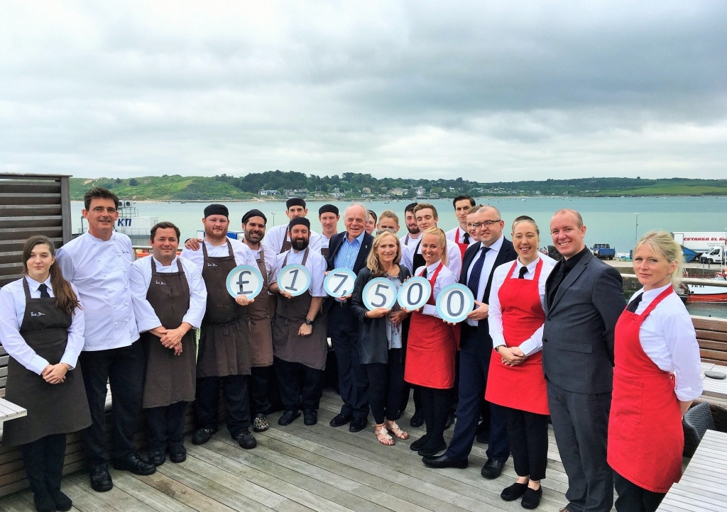 Staff from The Seafood Restaurant Celebrate the £17,500 raised from their charity lunches