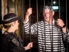 Prisoner behind bars with Police Officer at CHSW Jail and Bail fundraising event at Bodmin Jail