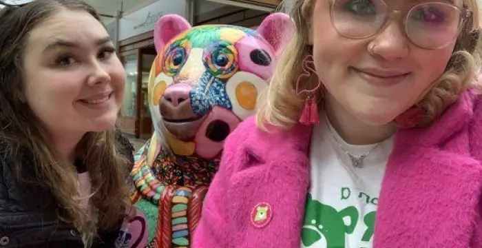 Two young ambassadors with a bear